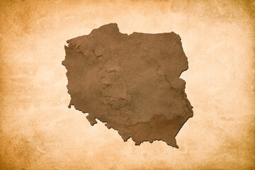 Brown map of Country Poland isolated on old paper grunge texture background. Polish National Day 11th of November.