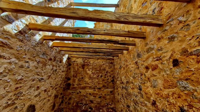 Closeup view at stone path, archaeological remains inside Spinalonga fortress in Greece, island of Crete, tourist destination