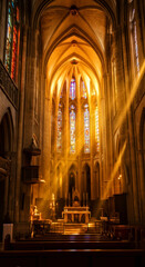 Fototapeta premium Sunlit Cathedral Interior with Stained Glass and Soaring Arches