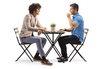 Two young men having a coffee at a cafe
