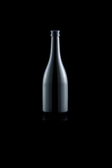 Elegant black wine bottle on a dark background for minimalist design