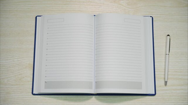 Open blank diary for hourly planning the day. Stop motion animation