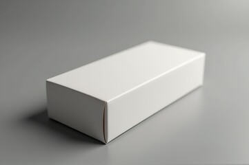 A clean, unmarked rectangular box lies on a sleek, neutral surface, evoking a sense of anticipation. Its simplicity suggests hidden treasures waiting to be discovered