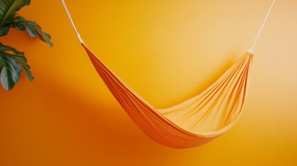 Golden Hammock Hanging Against Vibrant Yellow-Orange Wall, Promoting Relaxation and Tranquility