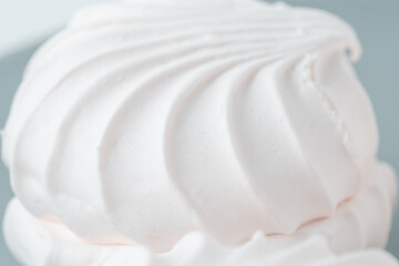 White meringue on white background soft focus with vintage filter.