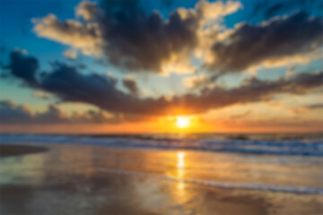 Obraz premium Conceptual blurry scenario of a beach at the sunset