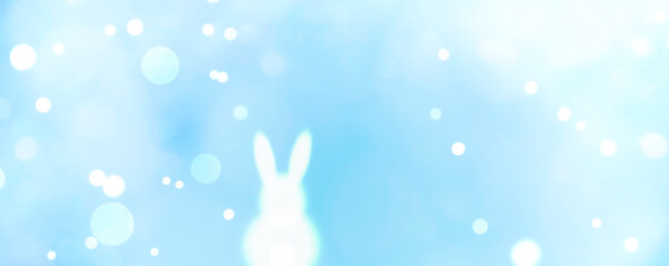 Easter bunny with blurred bokeh lights - spring background panorama greeting card - Season decoration banner
