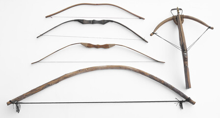 medieval wooden bows and crossbow isolated on white background