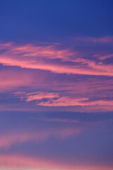 Pink and purple hues paint the twilight sky creating a serene and colorful atmosphere