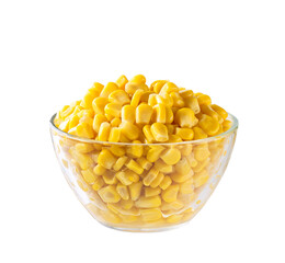 sweet corn kernels in a clear glass bowl isolated on white background.