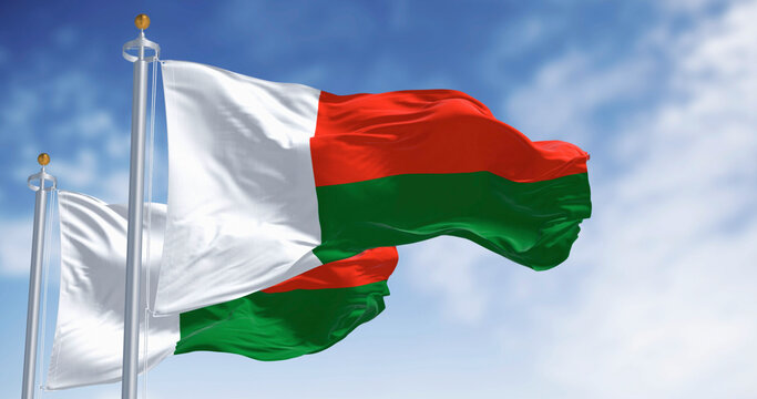 National flags of Madagascar waving in the wind on a clear day
