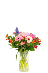 bouquet of beautiful pink flowers in clear vase isolated on white background 