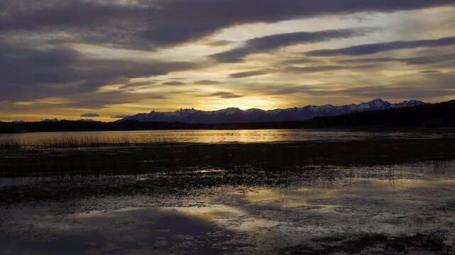 Panoramic sunset view of La Zeta lagoon, Natural reserve. Esquel, Chubut, Argentina