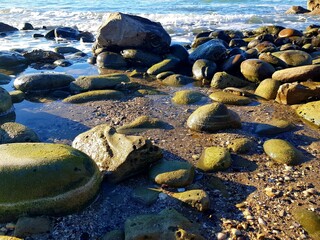 rocks on the beach in the evening light, beautiful photo digital picture