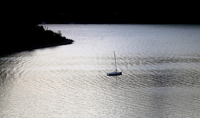 Photos of lakes and yachts at sunset