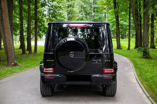 car in the woods forest Mercedes-Benz AMG G63 G-Class a true cross-country vehicle off-road logo detail