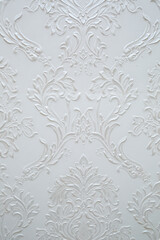 Pattern on a white wall. Texture of patterns on the wall.