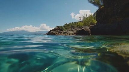 Fototapeta premium Coastal Rock Formation Overlooking Clear Ocean Water