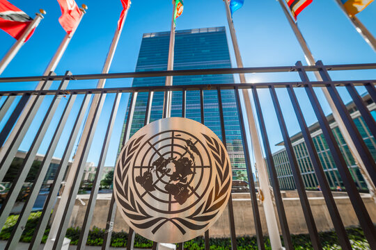 UN logo under a blue sky