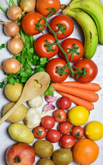 Zenith view. Background with healthy food, variety of vegetables and fruits, in vertical.
