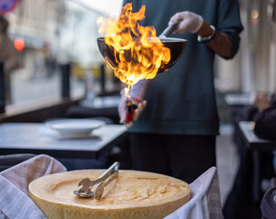 A Fiery Feast: Pasta Crafted in a Cheese Wheel with Stunning Flame Show