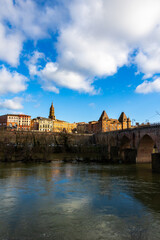 Panorama of Montauban city center with the Ingres Museum and Saint-Jacques Church, seen from the Tarn riverbank