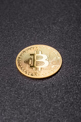 Bitcoin cryptocurrency dummy in the form of a round iron coin