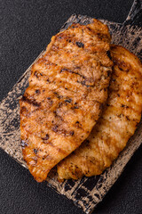 Delicious fresh grilled chicken fillet with spices and herbs