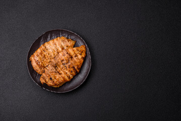 Delicious fresh grilled chicken fillet with spices and herbs