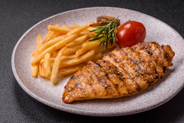 Delicious fresh grilled chicken fillet with spices and herbs