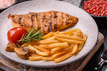 Delicious fresh grilled chicken fillet with spices and herbs