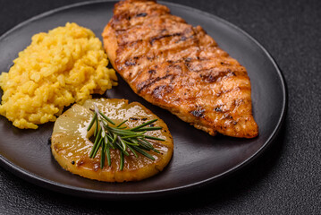 Delicious fresh grilled chicken fillet with spices and herbs