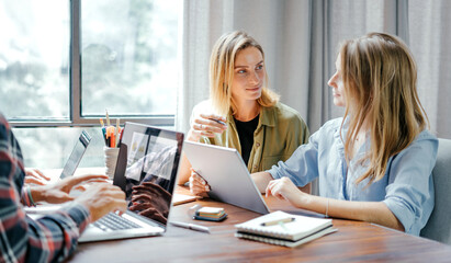 Group of young people working together. Creative business people in modern office