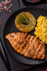 Delicious fresh grilled chicken fillet with spices and herbs