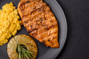 Delicious fresh grilled chicken fillet with spices and herbs