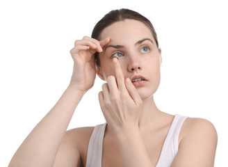 Young woman putting in red color contact lens on white background