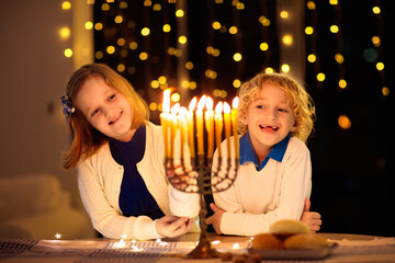 Kids celebrating Hanukkah. Festival of lights.