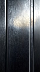 A clean, brushed metal texture in light silver.