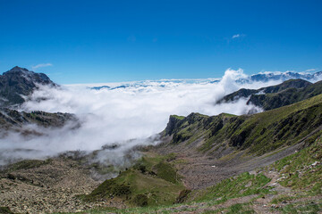 Fog in the valleys and sun on the mountain tops in the Pyrenees, France