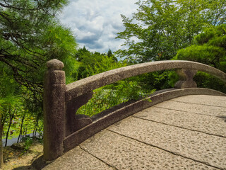 Japanese stone bridge in a park