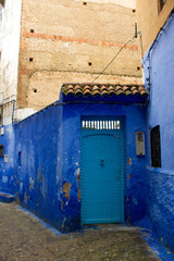 Blue walls with teal door in Chefchaouen, Morocco 