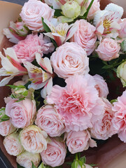 Summer blossoming delicate roses on blooming flowers festive background, pastel and soft bouquet floral card