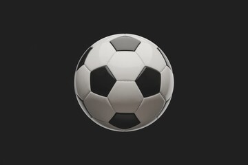 Obraz premium A classic black and white soccer ball against a dark background.