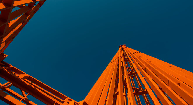 Striking Orange Steel Structure Against Vivid Blue Sky
