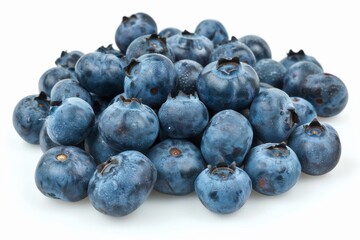 A vibrant collection of ripe blueberries arranged artistically on a clean, white surface, showcasing their natural sheen and richness isolated on transparent background