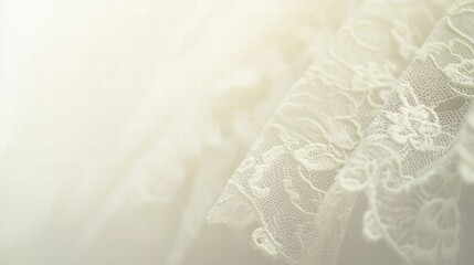 Delicate ivory lace fabric on soft neutral background