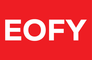 EOFY end of financial year symbol. Concept words EOFY end of financial year on wooden blocks on beautiful white background. Businessman hand. Business and EOFY end of financial year concept.