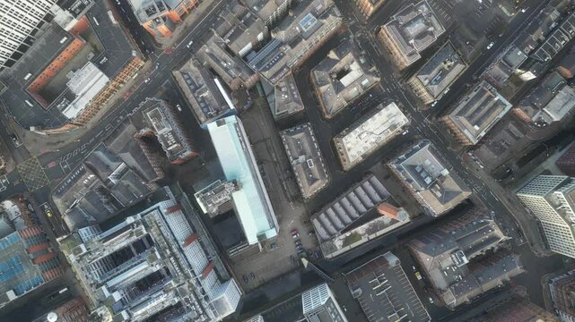 Aerial drone shot across Manchester shot from the west looking east at Deansgate Square, Manchester, UK