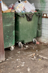 Green garbage can is used for waste containment and garbage collection located in special place for food waste