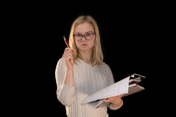 Serious Woman Pointing with Pen While Studying
